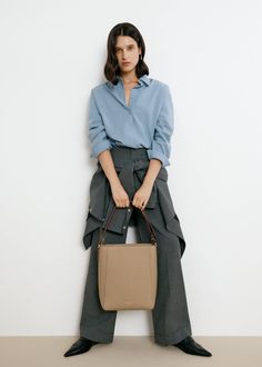 The Carrie Medium Tote Bag's rectangular silhouette sits perfectly on the shoulder, with a wide leather strap that is adjustable with the belt loop detail. Lined with smooth leather, the bag can fit an 13" laptop, making it an ideal everyday tote. Optional Add-ons: Webbing Shoulder Strap; AirPods Pro Case. Rectangular Bucket Bag With Detachable Strap For Work, Classic Crossbody Bucket Bag For Work, Workwear Rectangular Bucket Bag With Removable Pouch, Rectangular Workwear Bucket Bag With Removable Pouch, Rectangular Bucket Bag With Removable Pouch For Work, Timeless Shoulder Bag For Travel In Fall, Workwear Top Handle Bucket Bag, Workwear Bucket Bag With Detachable Strap, Elegant Bucket Bag With Adjustable Strap For Work