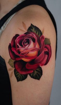 best rose tattoo ideas on the internet 2023 Beautiful Rose Tattoo, Red Rose Tattoo On Shoulder, Colour Rose Tattoo, Colored Rose Tattoo, 2 Roses Tattoo, Rose Tattoo Color, Color Rose Tattoo, Red Rose Tattoo Design