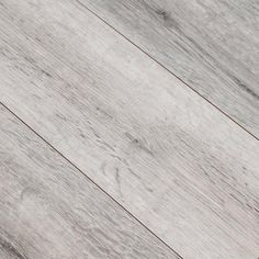 a white wooden floor with grey wood grains on the top and bottom part of it