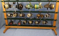 a display case filled with lots of different types of reels