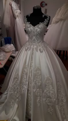 a wedding dress on display in a shop