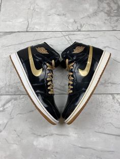 Shoe - Air Jordan 1 Black Metallic Gold Size - 14 Condition - used Comes With - original box This product is 100% authentic. It is highly sought after and this is the best price on ebay by far. ALL SALES ARE FINAL. WHAT YOU SEE IS WHAT YOU GET. NO REFUNDS WHAT SO EVER. WHEN PURCHASING BUYER AGREES TO THE TRANSACTION AND UNDERSTANDS THE CONDITION OF THE PRODUCT THEY ARE PURCHASING. Product will be shipped double boxed priority mail. This item is in hand ready to ship. Air Jordan 1 High Black, Air Jordan 1 Black, Jordan Gold, Jordan 1 Black, Athletic Models, Green Sneakers, Air Jordan 1 High, Jordan 1 High, Air Jordan 1 Retro