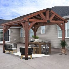 a patio covered with furniture and a wooden pergoline over the dining room table