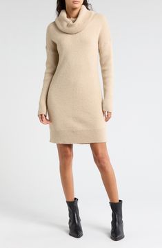 An oversized fit enhances the cozy vibe of a long-sleeve sweater-dress knit from ultrafine yarns. 36" length (size Small) Cowl neck Long sleeves 100% acrylic Dry clean Imported Black Owned/Founded Chic Neutral Sweater Dress For Winter, Chic Long Sleeve Neutral Sweater Dress, Neutral Long Sleeve Sweater Dress, Chic Cream Long Sleeve Sweater Dress, Cream Knee-length Sweater Dress For Winter, Cream Long Sleeve Sweater Dress For Fall, Cozy Long Sleeve Cream Dress, Fitted Neutral Sweater Dress For Winter, Cozy Cream Long Sleeve Dress