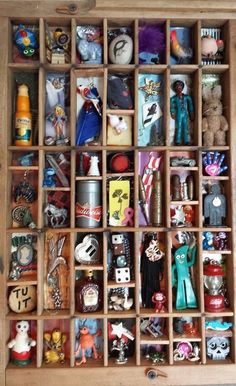 a wooden box filled with lots of different items