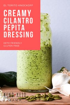 a jar filled with creamy cilantro pesto dressing