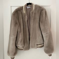 Brand New Without Tags. Bomber Jacket. A Sporty Bomber Jacket Is Updated In Plush Faux Fur. Front Zip Closure. Baseball Collar. Long Sleeves. Front Pockets. Ribbed Cuffs And Hem. Lined. Elizabeth James, Elizabeth And James, Fur Jacket, Gray White, Faux Fur, Bomber Jacket, Jackets For Women, Jackets & Coats, Long Sleeves