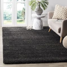 a living room scene with focus on the rug