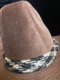 Lovely Stetson cowboy hat with woven band around the crown. Material feels like a short velour fabric. Great second hand condition Labeled as a size 6 3/4 - 6 7/8 Measures about 21.5 inches in circumference Western Brown Hat, One Size Fits Most, Western Brown Hat One Size Fits Most, Brown Western Hat One Size Fits Most, Rustic Brimmed Fedora For Winter, Rustic Fedora For Winter Country Events, Brown Hat Bands For Winter, One Size Fits Most, Vintage Fedora For Winter Ranch, Vintage Winter Fedora For Ranch, Western Fedora For Western-themed Events