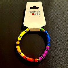 a bracelet made out of multicolored beads