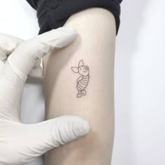 a person with a tattoo on their arm