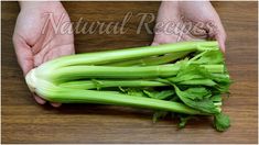 the celery is being held by two hands