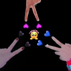 two hands reaching out towards each other with hearts coming out of their fingers and an emoticive smiley face on the screen