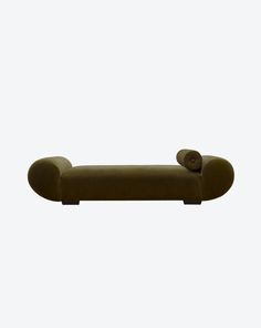 the back end of a couch with buttons on it's arms and legs, against a white background