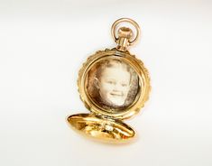 Victorian 14K Gold Watch Case Photo Keepsake Locket Pendant Victorian Yellow Gold Pocket Watch For Anniversary, Engraved Yellow Gold Pocket Watch For Wedding, Yellow Gold Self-winding Round Pocket Watch, Yellow Gold Self-winding Pocket Watch, Antique 14k Yellow Gold Watch, Heirloom Engraved Yellow Gold Pocket Watch, Collectible Yellow Gold Pocket Watch With Locket, Antique Engraved Jewelry And Watches For Wedding, Yellow Gold Pocket Watch With Locket For Collectors