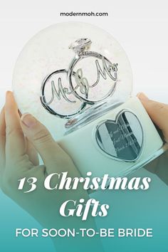 two hands holding a snow globe with the words, 13 christmas gifts for son - to - be bride