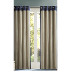 curtains with blue trims are hanging in front of a window, and the curtain is open