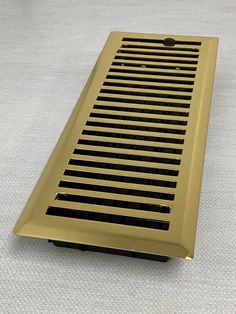 Decorative Polished Brass Metal Register - Contemporary Brass Vent Cover. Designer decorative air grille featuring a simple drop-in installation process. Our polished brass vent covers are crafted with a steel damper which allows for heating and cooling airflow control. The decorative air grille is also made with a 3mm thick faceplate, which is durable. The polished brass vent cover is crafted with a lacquered finish to help prevent wear and tear on the decorative air grilles faceplate. These de Brass Vent Covers, Air Vent Covers, Vent Covers, Knobs And Handles, Wire Mesh, Brass Metal, Heating And Cooling, Polished Brass, Ceiling