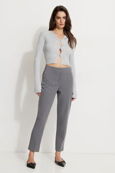 Fit right into these high-waisted slim-fit pants - Designed to be fitted with a stretch for easy dressing. Features - Zipper fly - Two-pocket styling - Creased legs - Back mock welt pockets Size & Fit - Slim leg - High-rise: 11.25" - Inseam Length: 27.5" Materials & Care - 67% Polyester, 29% Rayon, 4% Spandex - Machine wash, cold - Imported Easy Dressing, Soft Summer, Pants Design, Slim Fit Pants, Fit Pants, Slim Leg, Ankle Pants, Trouser Pants, Slim Legs