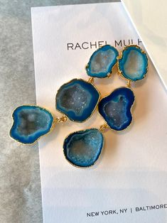 Arielle earrings are a stunner! And SO MUCH LIGHTER than they look. We hand select the thinnest stones to give you a big statement earring without the weight. Each pair is one-of-kind because no two stones are ever the same. Featuring 6 geodes set in 14k gold. Arielle comes in multiple colors, select in the drop down menu. Between 3-3.75 inches in length and beautifully move along the jawline. Can be requested to be smaller or larger as well. Easy to dress up or down! Arielle is versatile and ca Elegant Gold Geodes, Elegant Natural Stone Geodes As Gift, Big Statement Earrings, Silver Boots, Agate Earrings, Craft Jewelry, Statement Earring, The Drop, Ear Rings