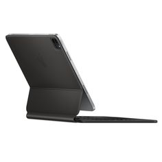 an ipad case is open on top of a laptop