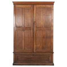 an old wooden armoire with two doors