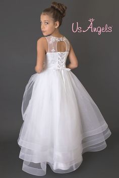 Illusion Satin and tulle full-length A-line dress with embroidered floral applique bodice, full gathered multi-tiered tulle overlay skirt with horsehair hem. Peek-a-boo Illusion back with lace up tie back. #firstcommunion #communion #baptism #holycommunion #primeracomunion #wedding #christening #firstholycommunion #comunion #firstcommuniondress #communiondress #birthday #personalised #comuniones #kommunion #events #christenings #babyshower #cake #party #flowergirl #girlsdresses Tulle Overlay Skirt, Lace Mesh Dress, Athena Dresses, Holy Communion Dresses, First Communion Dress, Overlay Skirt, White Flower Girl Dresses, First Communion Dresses, Embroidered Organza