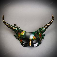 This Is Forrest-Themed Devil Krampus Long Horns Mythical Mask Is A Beautiful Masquerade Mask In A Green Gold Forest Theme For Your Unique Halloween Costume, Masquerade Party, Or Special Event. It Comfortably Covers Your Full Face And Is Secure With An Elastic Strap On The Back. While Not Using It, It Can Be Displayed On The Wall. This Luxurious Mask Is Made To Be Worn All Night Showing Elegance And Richness In A Beautiful Design. Made Of Plastic And Decor With Snakes And Forest Elements. This Ma Forest Mask, Garden Outfit, Forest Elements, Forest Theme Party, Costume Masquerade, Long Horns, Long Horn, Party Mask, Unique Halloween Costumes