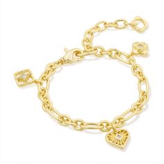 The Lacie Statement Charm Bracelet will be the conversation starter you won't want to take off. Featuring etched hearts and medallion shapes designed after the Kendra Scott logo, this contemporary take on the nostalgic jewelry trend is everything and more. To preserve your fashion jewelry for years to come, agents such as soaps, perfumes, lotions, makeup, hair and cleaning products, and other chemical contact should be avoided. Take care to remove jewelry before showering, sleeping, exercising o Kendra Scott Charm Bracelet, Nostalgic Jewelry, Target Jewelry, Senior Szn, Presents For Best Friends, Bracelets Collection, Xmas Wishlist, Piercing Inspo, School Jewelry