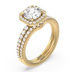 a yellow gold engagement ring with two rows of diamonds