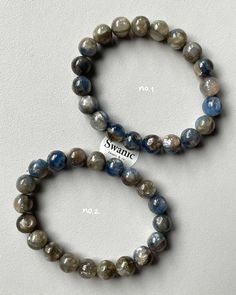 #Rare Natural Blue Kyanite with Mica สร้อยข้อมือไคยาไนต์เกรดหายาก ติดควอตซ์เนื้อใส กับไมกาสีขาวมุก ช่วยกันเล่นแสงโดดเด่นจากไคยาไนต์แบบปกติค่ะ [Super Premium] ❌No.1 9.4-9.9mm ✔️No.2 9.1-9.8mm (1390.-) ส่งฟรี ปรับลดไซส์ฟรี ชมรายละเอียดแต่ละเส้น @swanic.co.stock ⛏️Kyanite เป็นแร่อลูมินาซิลิเกต โดยทั่วไปมักพบใน pegmatites ที่มีปริมาณของธาตุอลูมิเนียมสูง และเกิดในสภาวะที่มีความดันสูง มักพบร่วมกับควอตซ์และไมกา มีสีสันที่น่าหลงไหล แต่มีความเปราะค่อนข้างสูง เนื่องจากมีลักษณะของผลึกเป็นเส้นและแผ... Blue Kyanite, Blue