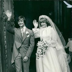 the bride and groom are waving their hands