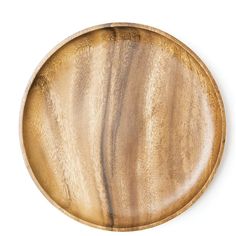 an oval wooden tray on a white background