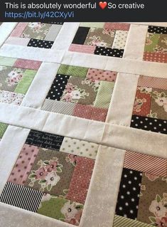 a close up of a patchwork quilt with flowers on it and the words, this is absolutely wonderful so creative