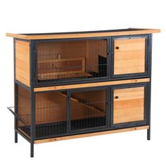 a large wooden and metal cabinet with two cages on the top, one is open