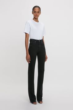 A favourite from the house’s denim library, the Julia Jean is reimagined in a Washed Black stretch denim exclusively for AW24. Characterised by a high waistline, straight leg and relaxed fit, the Julia is tailored from soft 100% cotton denim for a casual but sophisticated look. A silver branded denim shank button and copper branded rivets, tobacco topstitching and a branded leather patch at the back of the waist reflect the house’s consistent attention to detail. Styled with the Victoria T-Shirt Straight Leg Jeans Black, High Waisted Jean, Shank Button, Leather Patches, Black Stretch, Rivets, Victoria Beckham, High Waist Jeans, Stretch Denim