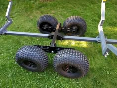 two large wheels are attached to the trailer