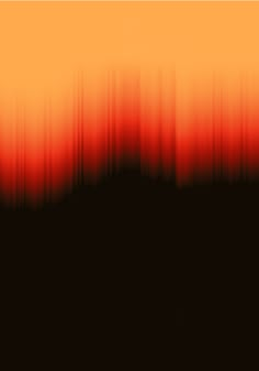 an orange and red blurry background with trees