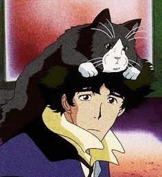 a cat sitting on top of a man's head