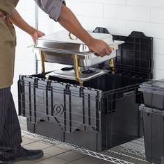 Transport and store your chafers safely thanks to this Choice 26" x 19" x 15 1/4" stackable black chafer tote / storage box with attached lid! This box is an excellent way to store and transport chafers or your other catering equipment without the concern of damaging or losing parts along the way. Designed for long-lasting use in your commercial foodservice environment, its high-density plastic material is impact-resistant, so you won't have to worry about scratches or dents during transport. Th