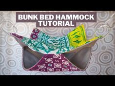 an ornament is made to look like a bed hammock with colorful fabric