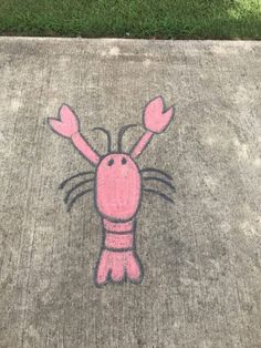 a sidewalk with a drawing of a pink bunny on it