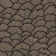 an abstract black and brown pattern on fabric