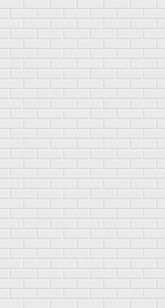 a white brick wall that has been painted in the same color as it appears to be