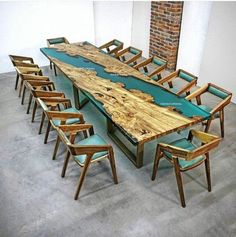 a long table with chairs around it and a large wooden slab on the top that is shaped like a boat