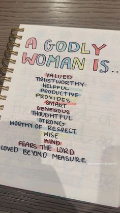 a notepad with writing on it that says, a godly woman's