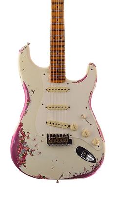 an electric guitar with pink paint on it