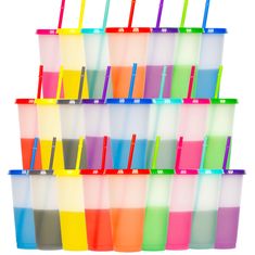 a stack of plastic cups with different colored straws and drinking glasses on top of each cup