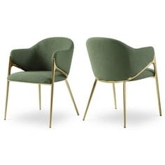 two green chairs sitting next to each other on top of a white surface with gold legs