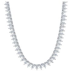 This beautiful and elegant 18 karat white gold necklace features 335 round, pear, and marquis shaped diamonds with a total carat weight of 22.67 carats that are suspended along the neckline. Box safety clasp. The necklace is 17" in length. Diamond Neckless, Marquis Diamond, Cocktail Necklace, White Gold Necklace, Big Diamond, Expensive Jewelry, White Gold Necklaces, Marquise Diamond, Emerald Jewelry